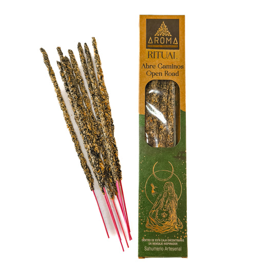 Incienso artesanal y orgánico, con el texto "Incienso Ritual Abre Caminos" visible en el empaque. Varitas de incienso orgánico.