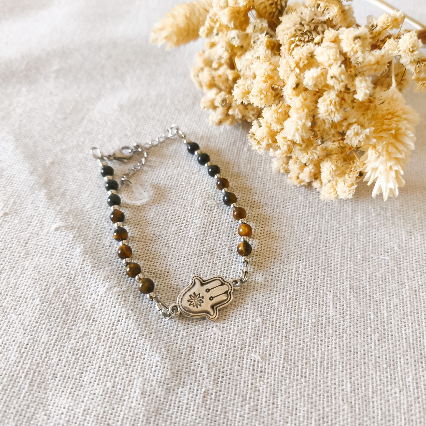 Pulsera Amuleto Aleja Envidia Plateado.