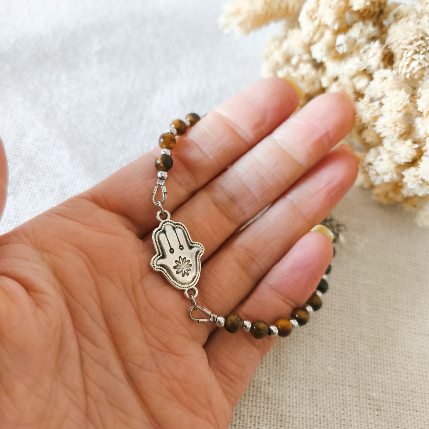Pulsera Amuleto Aleja Envidia Plateado.